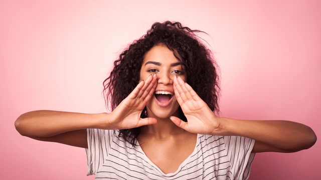 GL Woman shouting w hands up Woman speaks up