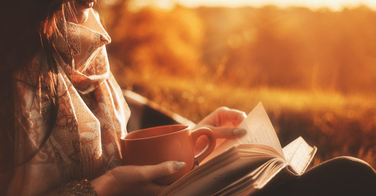 GL Woman Reading w_ Cup 1200x600 Woman Reading a Book